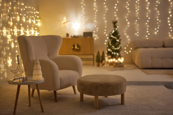 evening christmas new year interior in scandinavian style, home decoration with garlands